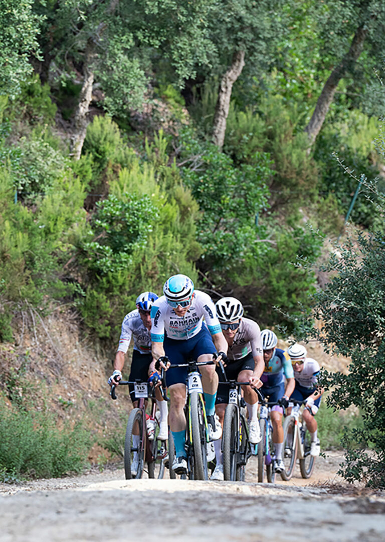 Peloton of cyclists in the UCI Gravel World Series sports event of Sea Otter Europe